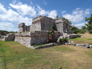 View of ancient ruins of stony mayan temple at TULUM city at Mexico on archaeological site with...