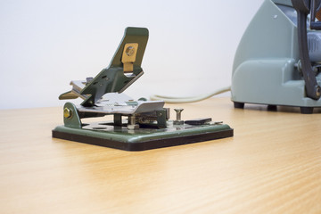 Flat lay photography of old film editing method. Vintage equipment. Concept of editing. Top view.