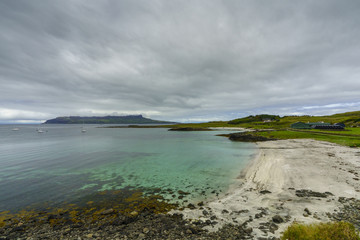 The Isle of Eigg as seen from the island of Muck.  Eigg is one of the Small Isles, in the Scottish Inner Hebrides.