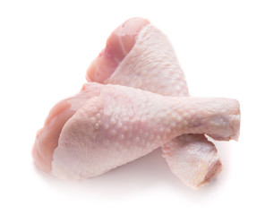 Raw chicken legs on white background