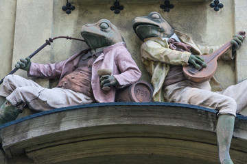 Portal with figurines of frogs located at the "Pod Zabami" Tenement House in the city of Bielsko - Biala. Poland, Europe.