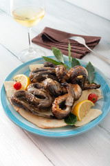 Anguille arrosto, tipico cibo sardo,  roasted eels, Sardinian food