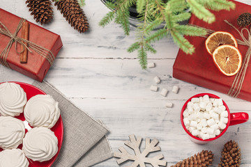 Obraz na płótnie Canvas Christmas still life with zephyr and hot drink with marshmallow