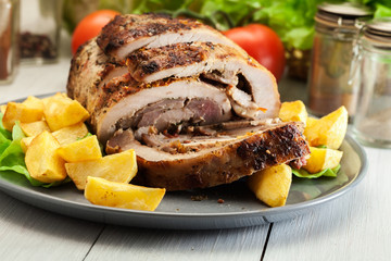 Roasted pork roll stuffed with other meat