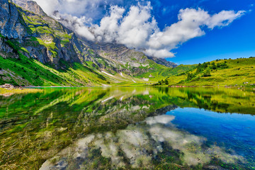 Fototapeta na wymiar Stunning view of Oberlegisee lake in Braunwald of Switzerland