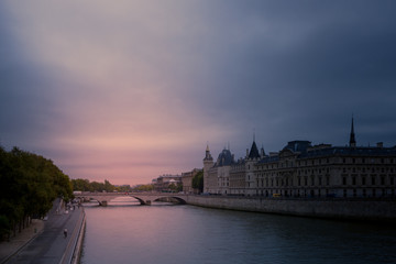 Fototapeta premium Sunset over the Pont Du Change and the Palais De La Cite in Paris , with the River Seine, shot in October 2017