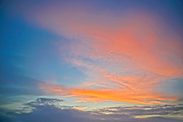 Beautiful white and gray clouds against the blue sky. Summer and autumn day with a view from the airplane to the atmosphere. Stock Photo for design