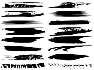 Collection of artistic grungy black paint hand made creative brush stroke set isolated on white background. A group of abstract grunge sketches for design education or graphic art decoration