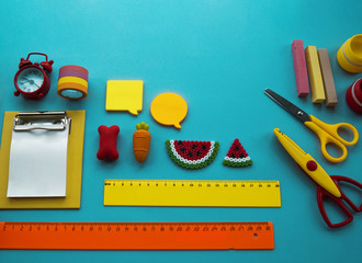 School supplies on blue background. Back to school