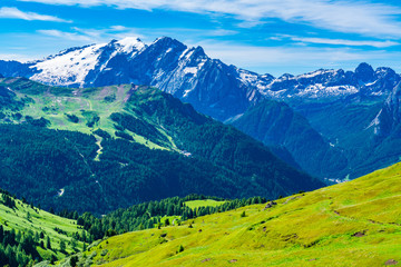 View of the snow covered Dolomites Mountain in summer