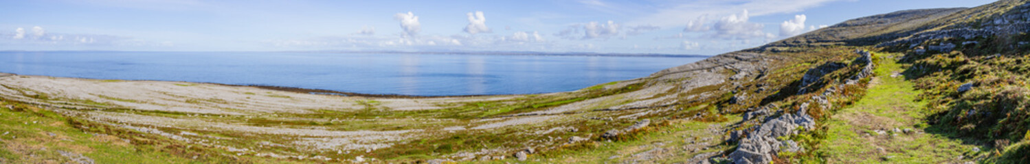 Obraz premium Panorama of Hiking trail with stone walls in Burren mountains