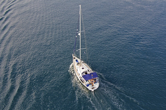 Aerial view to Sailing ship Yacht in blue sea
