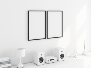 Two Black Poster frames mockup above stereo system