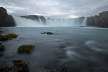 waterfall in iceland in the mountain