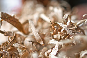 Beautiful carpentry background. Sawdust in focus and with a blurry image. Abstract composition for design. Stock photo.