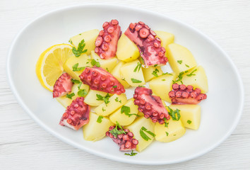 delicious plate of octopus salad with potatoes