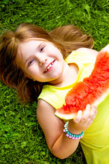  girl eating watermelon outdoor