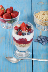 mixed fruit parfait with spoon
