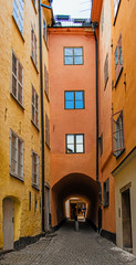 Stockholm old narrow cobblestone street in the historical city center gamla stan. Sweden.