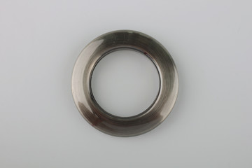 Plastic rings for fastening the fabric to the cornice for curtains. Multicolored plastic eyelets for curtains. Square, rectangular, triangular, round eyelets for curtains.