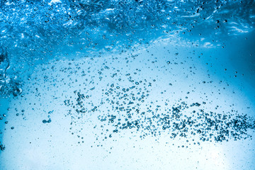 Many bubbles in water close up, abstract water wave with bubbles - 219667119