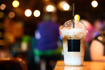 Iced coffee in disposable to go cup  coffee latte in take away or to go cup