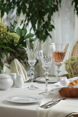 crystal glasses on the table in the restaurant table setting
