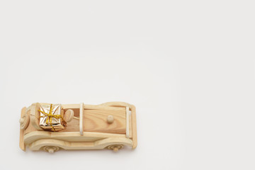 wooden car lucky gift for Christmas. Copy space. 