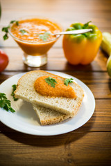 Homemade caviar of vegetables on a slice of bread