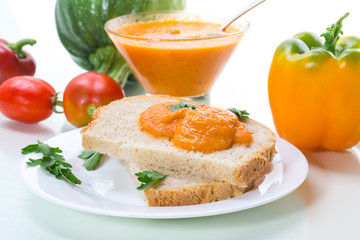 Homemade caviar of vegetables on a slice of bread