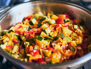 Hot homemade organic steamed vegetables in frying pan 