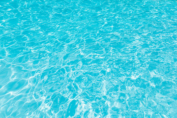 Beautiful ripple wave and blue water surface in swimming pool, Blue water for background and abstract