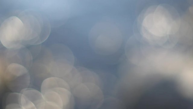 Tranquill and calm water reflections and light leaks bokeh 4K.mp4