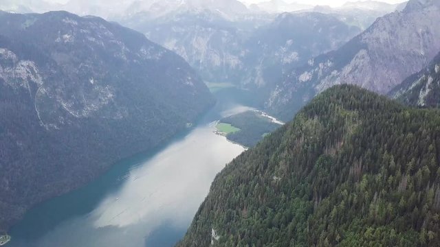 Beautiful view of the Konigsee lake near Jenner mount in Berchtesgaden National Park, Upper Bavarian Alps, Germany, Europe. Beauty of nature concept background aerial drone video