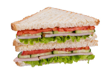 sandwich on toasted bread with ham and cucumber, tomato and lettuce, on white background, isolate