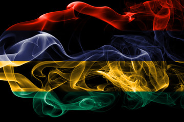 National flag of Mauritius made from colored smoke isolated on black background. Abstract silky wave background.
