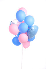 bundle of pink and blue air balloons isolated on white
