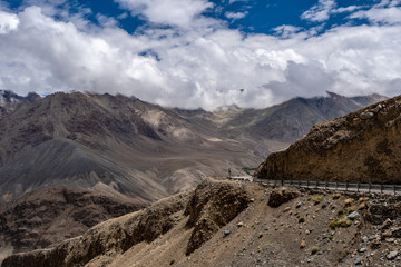 Khardung La Pass Leh Ladakh India Highest road of The World in Summer with Blue Cloudy sky and mountains