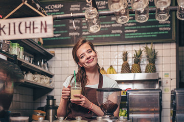 Young girl with smoothie