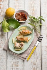 turkey rolled up with dried tomato sage and oregano