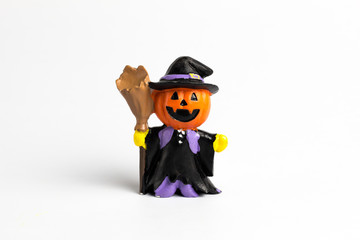 Wizard doll halloween pumpkin with a broom.