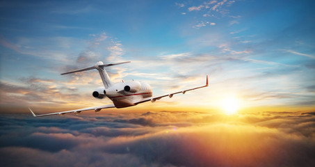 Private jet plane flying above clouds - obrazy, fototapety, plakaty