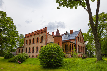 Fototapeta na wymiar Zvartava castle is neogothic masterpiece of Latvia.