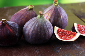 Fresh figs. Food Photo. whole and sliced figs on rustic background.