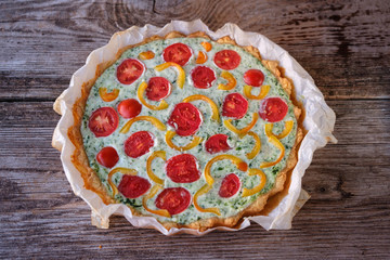 French quiche with tomatoes, pepper and broccoli