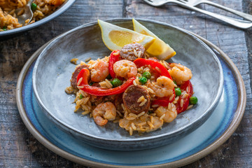 Spanish paella with prawns, chicken, chorizo and red pepper