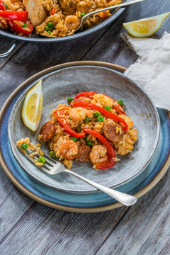 Spanish paella with prawns, chicken, chorizo and red pepper - high angle view