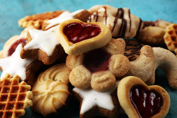 Mixed Christmas cookies. Colorful mix of Christmas-themed decorated cookies