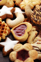Mixed Christmas cookies. Colorful mix of Christmas-themed decorated cookies