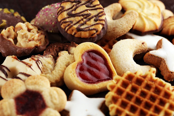 Mixed Christmas cookies. Colorful mix of Christmas-themed decorated cookies
